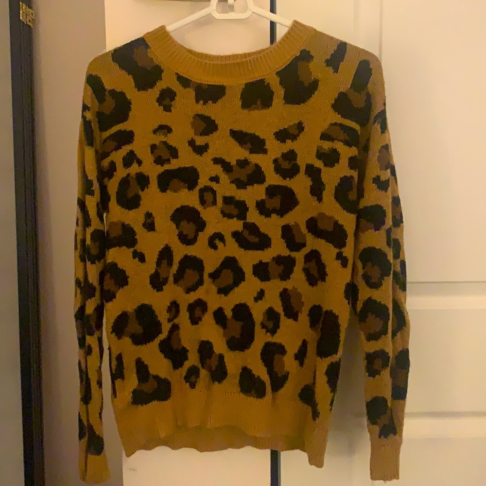 Leopard print pull over sweater size medium